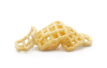 Square shape checkered fried airy snacks (duros or chicharrones wheat pellet) isolated on white background