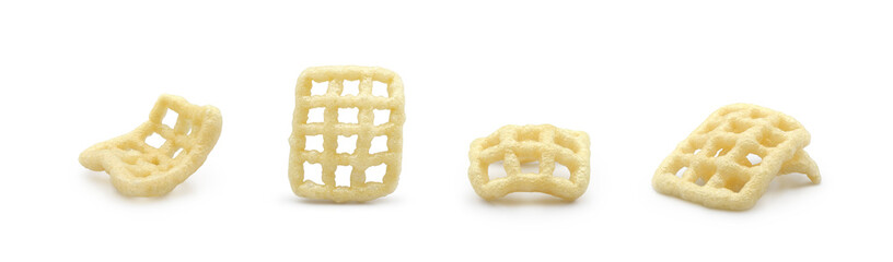 Square shape checkered fried airy snacks (duros or chicharrones wheat pellet) isolated on white background