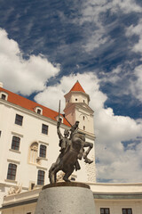 Naklejka na ściany i meble Statue of King Svatopluk and Bratislava castle in the background, Bratislava, Slovakia
