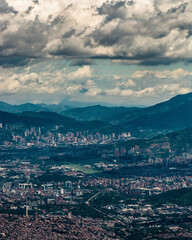 Medellin landscape city and mountains on a cloudy afternoon a lot of buildings