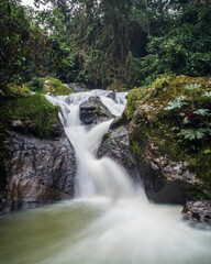 Waterfall in colombian mountains Thermal river