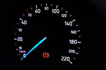Car dashboard panel icon on a black background.emergency brake symbol
