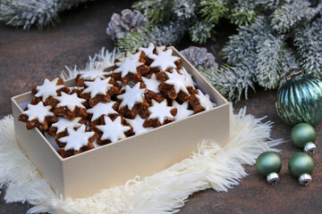 Box of cinnamon stars, a traditional German Christmas cookie.