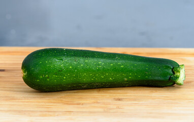 fresh zucchini on table