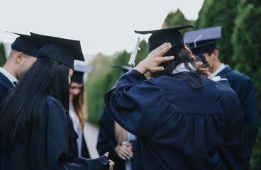 University Students Graduating and Embracing Success and Share Positive Memories in Park Celebration