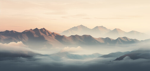 Obraz premium Panoramic mountainous landscape with soft desaturated brown colors and a forest covered in fog and mist.