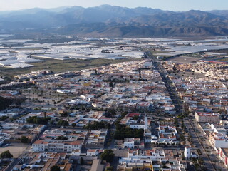 Aerial view of El Ejido with mountains in the background