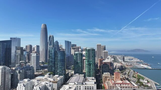 San Francisco, USA, flight along the  Skyscraper Skyline of "South of Market" (SoMA) district with famous Salesforce Tower and other new modern buildings - aerial video footage 