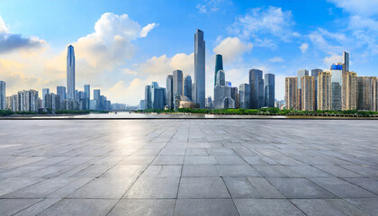 empty square floor and city skyline with modern buildings in guangzhou guangdong province china panoramic view - obrazy, fototapety, plakaty