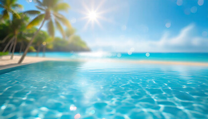 Fototapeta na wymiar tropical nature clean sea beach summer vacation travel blurred sun light blue ocean water sky and bokeh abstract background sunshine shades of blue artistic natural swimming pool texture
