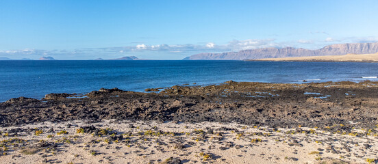 View of the famara cliffs from caleta de caballo, lanzarote