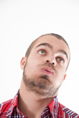 Obraz premium Exasperation clear, upward glance, stubble