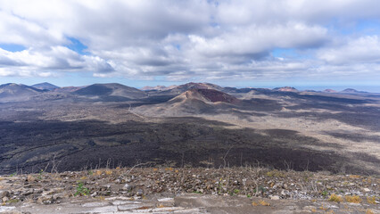 The lunar landascape of lava with the vulcanos in Lanzarote, canaries, view of the Timanfaya national park