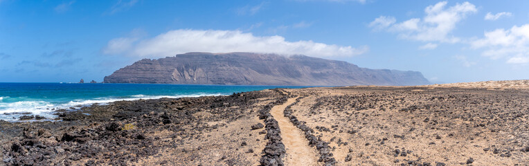 Fototapeta na wymiar Hiking trail in the Graciosa island, Canary, Spain, close to Lanzarote, escape sustainable travel lifestyle healthy vacation safe place bucolic idyllic arcadian