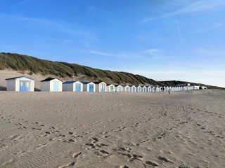 Foto op Plexiglas Cute white cottages by the beach, small beach huts, paradise beach, water sports  © Thomas