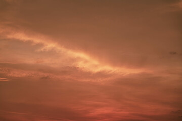Red orange glowing sky highlighted by Sunset, tropical Thailand. Close up photo.
