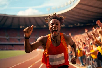 Schilderijen op glas african olympic runner celebrating victory after a race on olympic stadium track © Marko Domka