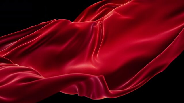Red fabric in slow motion, close up on wavy satin cloth.