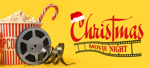 Christmas banner with bucket of popcorn, candy cane and film reel on yellow background