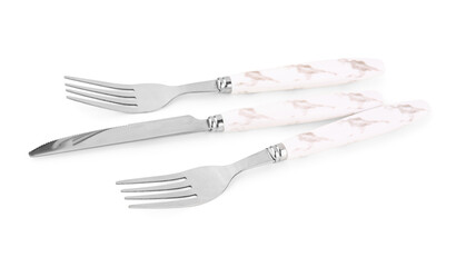 Stainless steel forks and knife with plastic handles on white background