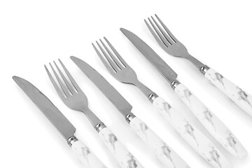 Stainless steel forks and knives with plastic handles on white background