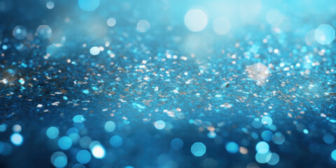 shiny blue background with glitter and a small focus area and out of focus areas - obrazy, fototapety, plakaty