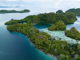 The incredibly scenic islands of Pef are fringed by mangrove trees and surrounded by beautiful...