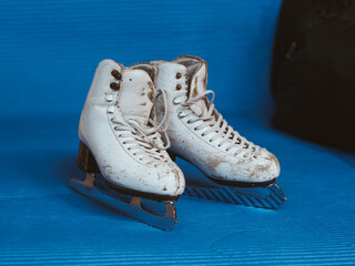 Old figure skating skates. Preparation for training. Figure skating equipment 