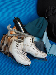 Old figure skating skates. Preparation for training. Figure skating equipment 