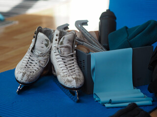 Old figure skating skates. Preparation for training. Figure skating equipment 