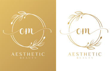 Letter OM Beauty Logo with Flourish Ornament