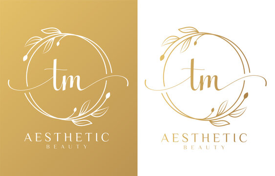 Letter TM Beauty Logo with Flourish Ornament