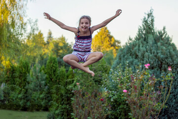 A girl Jumping on trampoline