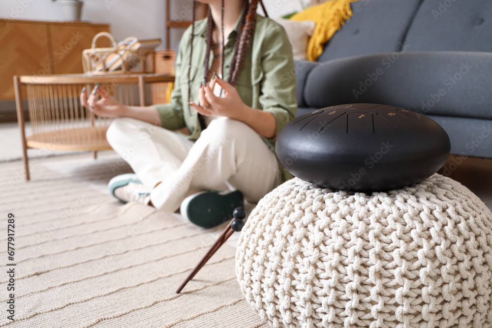 Poster Glucophone on pouf in living room, closeup