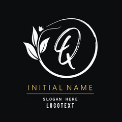hand drawn Q letters Logo design. Brushstroke Q Letter Logo Design. luxury initial Q logo design isolated leaf and flower.eps8