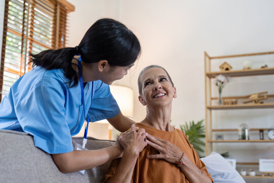 Elderly Touch Hand On Back Of Hand Caregiver Or Nurses To Express Thankful