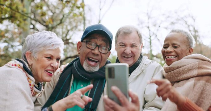 Joke, funny and group of senior friends in a park or nature for outdoor holiday or vacation smile for a picture together. Meme, phone and laughing elderly people take picture for social media
