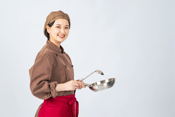 調理服を着た女性　調理師　飲食店店員