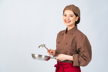 調理服を着た女性　調理師　飲食店店員