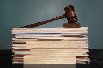 Wooden blocks with Injury Law words. Legal concept