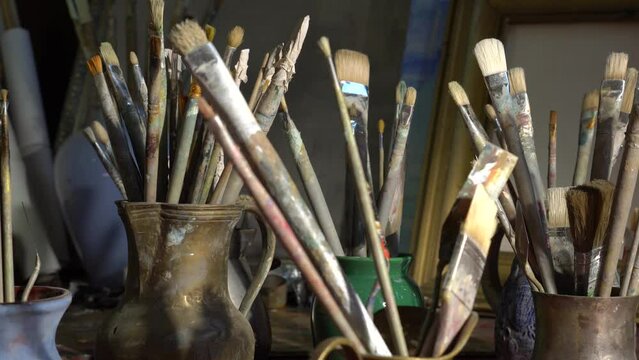 Art Painting Workshop. Art studio or class for artist, Creativity workshop. Professional painting tools, brushes, oil paints, palette, canvas, easel, picture frames, palette knife