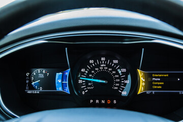 Modern car dashboard showing gauges - obrazy, fototapety, plakaty