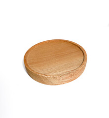 Round wooden coasters isolated on white background.
