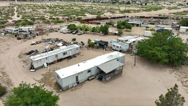Mobile home trailer park housing in desert in USA. Low income housing neighborhood in Southwest America.