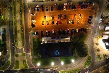 Beautiful High Angle Footage of Illuminated Central Letchworth Garden City of England UK. The Footage Captured with Drone's Camera on November 11th, 2023 at Just After Sunset and During Night