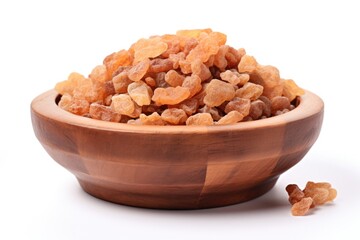 Frankincense tears, pieces of olibanum resin, in a wooden bowl. Generative AI