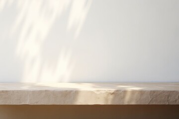 Empty stone table for product presentation on a minimalist background with sun shadow