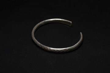 Hmong silver jewelry on black background, Handmade silver accessories