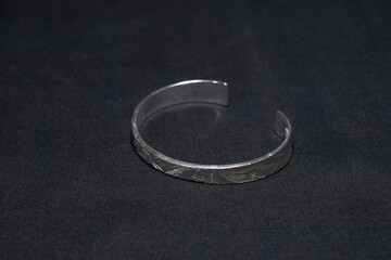 Hmong silver jewelry on black background, Handmade silver accessories