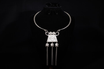 Hmong silver jewelry on black background, Handmade silver accessories